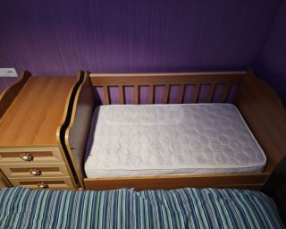 მრავალფუნქციური საბავშვო საწოლი – რწევის ფუნქციითა და სათავსოებით