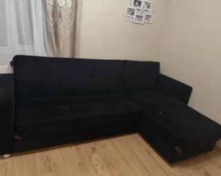 კუთხის დივანი სათავსოთი და გასაშლელი მექანიზმით